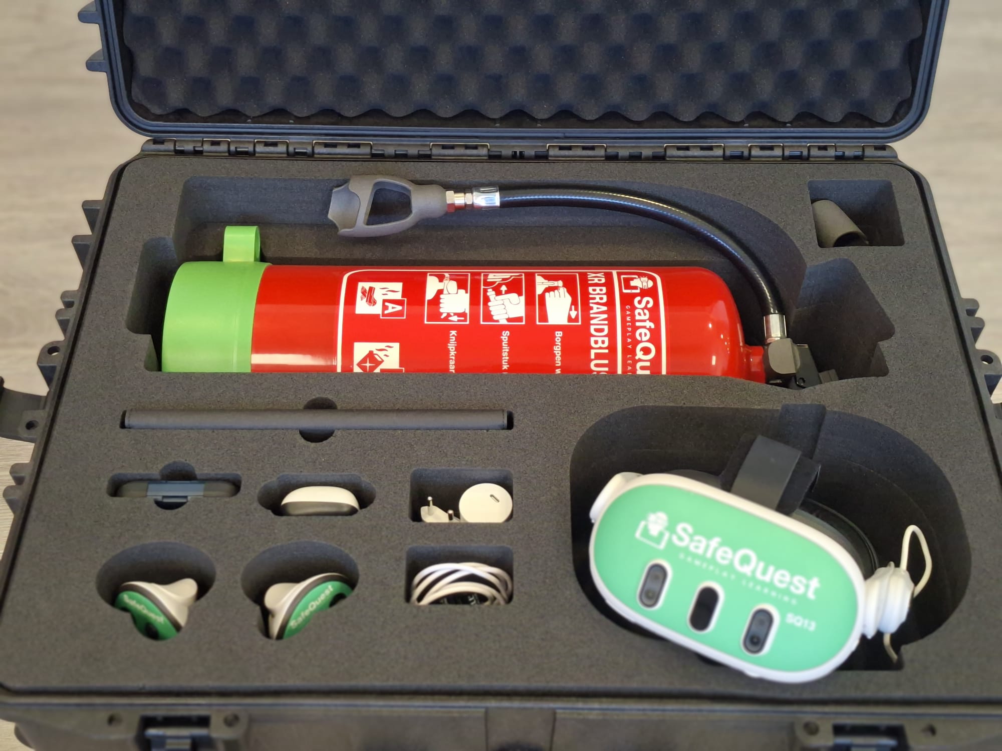 Professional transport case with foam interior — extinguisher, headset, accessories